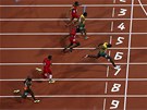 NEJRYCHLEJÍ. Jamajský sprinter Usain Bolt dobíhá do cíle olympijské stovky, za...