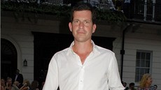 Bývalý britský tenista Tim Henman komentuje pro BBC olympijský turnaj ve