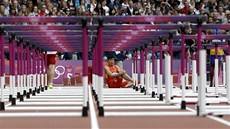 ZDRCENÝ PEKÁKÁ. ían Liou Siang sedí smutn na dráze, i na olympijských