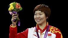 Čínská stolní tenistka Li Siao-sia se raduje ze zlaté medaile.