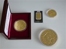 Zlaté medaile, investiční mince a slitek.