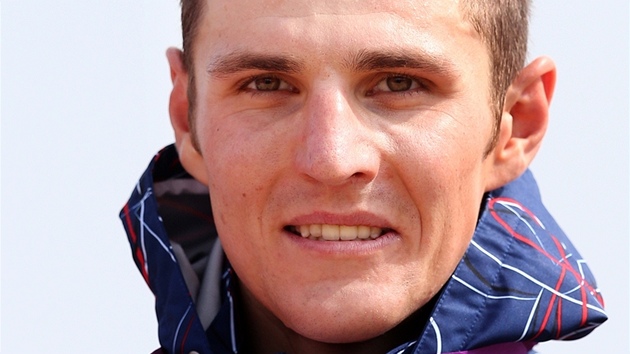 SPOKOJENÝ VÝRAZ. Český biker Jaroslav Kulhavý se chlubí zlatou medailí z olympijských her v Londýně.