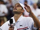 EMOTIVNÍ LOUENÍ. Americký tenista Andy Roddick ukonil ve 30 letech kariéru.