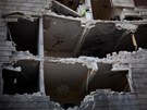 Budova v syrském Aleppu zniená ostelováním (15. záí 2012)
