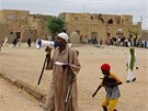 Písluník islamistického hnutí Ansar Dine svolává obyvatele Timbuktu k