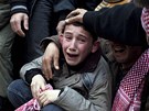 Vydení syrtí civilisté v Idlíbu (8. bezna 2012)