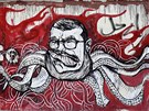 Graffitti znázorující Muhammada Mursího na venkovní zdi prezidentského paláce