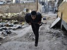 Bojovník Syrské osvbozenecké armády v Aleppu (25. prosince 2012)