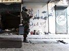 Aleppo. Modlitba syrských povstalc uprosted boj (25. prosince 2012)