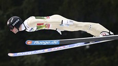 Norský skokan na lyích Anders Jacobsen pi tetím závodu Turné ty mstk v