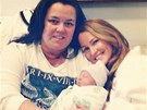Rosie O'Donnellová a Michelle Roundsová s jejich dcerou Dakotou (9. ledna 2013)