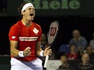 VÍTZNÝ EV. Kanadský tenista Milos Raonic vybojoval v daviscupovém klání proti...