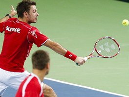 JEDNORUNÝ BEKHEND. Stanislas Wawrinka a jeho bekhendový úder, který sleduje...