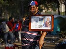 Sbohem prezidente. Venezuelané ekají v mnohahodinových frontách na anci