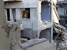 Trosky v centru syrského msta Homs (25. bezna 2013)