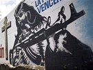 Jeí se samopalem. Graffiti v ulicích Caracasu