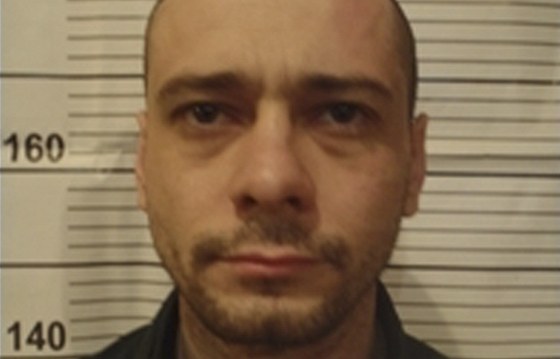 Sergej Pomazun, údajný estinásobný vrah, na policejním snímku (22. dubna 2013)