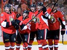 Ottawa Senators oslavují gól. Radují se (zleva) Daniel Alfredsson, Cory