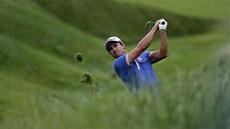 Adam Scott bhem prvního dne golfového US Open.