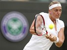 Petra Kvitová v utkání 3. kola Wimbledonu s Ruskou Jekatrinou Makarovovou.