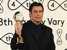 Herec John Travolta s Kiálových glóbem na zahájení 48. roníku mezinárodního