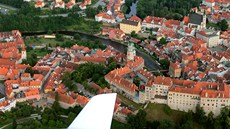 V cest na cílové letit nám stojí eský Krumlov. To si nememe nechat ujít,...