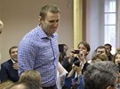 Ruský opozičník Alexej Navalnyj si ve čtvrtek vyslechl u soudu verdikt vinen v