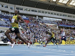 UDEIL BOLT. Jamajan Usain Bolt si v Moskv dobhl pro dal zlato. Po