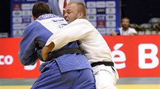 Alexandr Jure�ka (v bílém) se utkal 30. srpna na mistrovství sv�ta v judu v Rio...