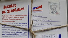 Zemanovci nechali dát do schránek oban korespondenní lístky s peticí za