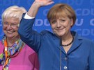 astná Angela Merkelová, její strana vyhrála volby.