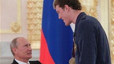 Ruský prezident Vladimir Putin a volejbalový reprezentant  Dmitrij Muserskij si