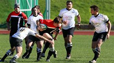 Momentka z utkání ragbist karlových Var a Rakovníka.