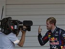 JSEM VÍTZ, ROZUMÍ? Sebastian Vettel gestikuluje do kamery po vítzství ve