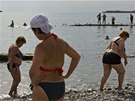 Tourists enjoy the evening sun at the beach in central Sochi September 19,...