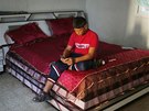 Newlywed Ahmed Soboh, 15, sits inside his bedroom two days after his marriage...