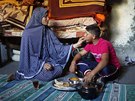 Newlywed couple Ahmed (R) and Tala Soboh, who are 15 and 14 years old...