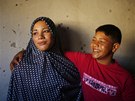 Newly married Tala Soboh, 14, poses for a photograph with her 15-year-old...