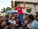 Young Palestinian groom Ahmed Soboh, 15, is welcomed by his relatives a day...