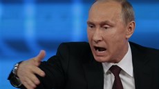 Ruský prezident Vladimir Putin b�hem tiskové konference vysílané státní...