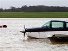Dé a záplavy komplikovaly leteckou i pozemní dopravu (26. prosince)
