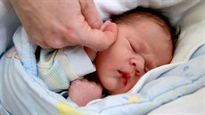 Tomá se narodil minutu po plnoci v brnnské porodnici na Obilním trhu.