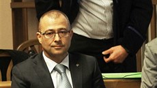 Bývalý ministr obrany Martin Barták u soudu (20. ledna 2014)