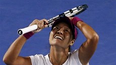 astná Li Na, práv se stala vítzkou Australian Open.