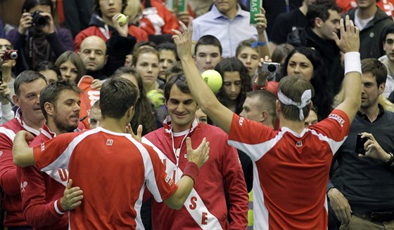 POSTUP. výcartí tenisté vetn Stanislase Wawrinky (vlevo) a Rogera Federera