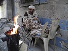 Obyvatele obleených tvrtí Homsu trápí zima a nedostatek topiva (1. února 2014)