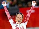 Ruská rychlobruslaka Olga Grafová se raduje z výsledku v závod na 3 000 metr...