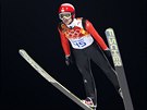 výcarský skokan na lyích Simon Ammann na stedním mstku. (9. února 2014)