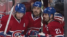 Andrej Markov, Tomá Plekanec  a Brian Gionta (vlevo) z Montrealu oslavují gól.