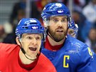 Patrik Eliá a Henrik Zetterberg pi prvním olympijském utkání eské hokejové...